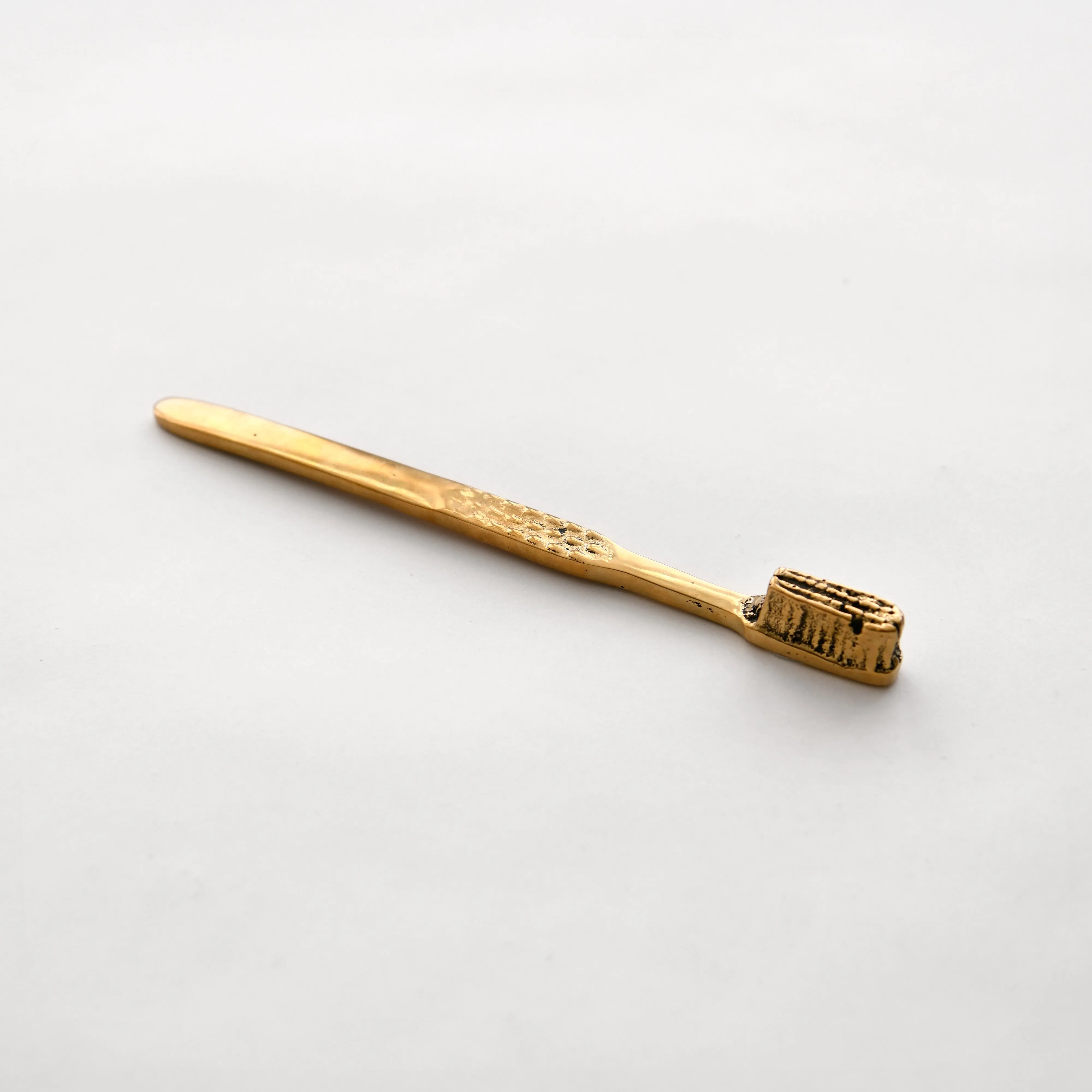 Nancy Pearce Bronze Tooth Brush